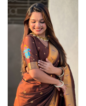 Floral designs woven into brown soft silk sarees