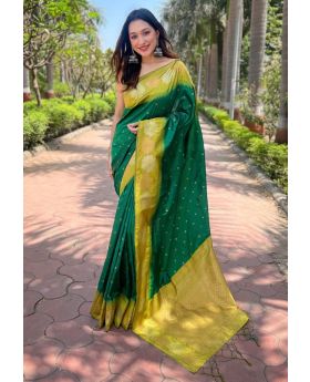 Little designs on a green soft silk saree Zari Weaving