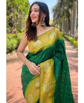 Little designs on a green soft silk saree Zari Weaving