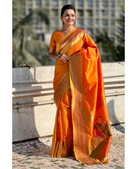 Soft silk sarees in orange Paithani with floral designs