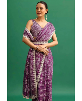 Digitally printed purple Chinnon silk saree with embroidery.
