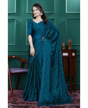 Multi-sequence and cut embroidery on a teal rangoli silk saree