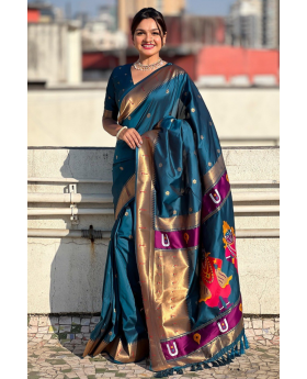 Teal soft silk sarees woven with floral designs