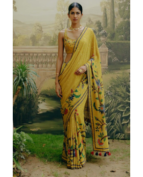 Floral heavy georgette saree in yellow.