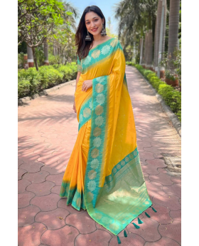 Saree made of soft silk in yellow with little motifs Weaving Zari